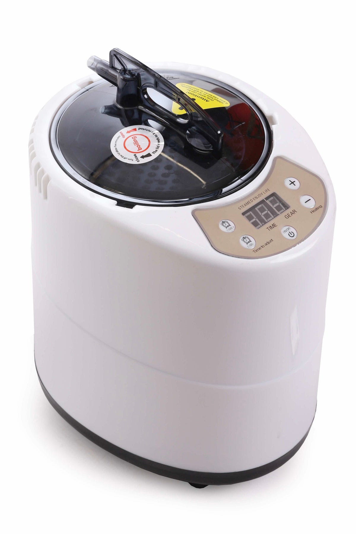 Close-up of the digital smart steam generator unit with control panel and black lid.