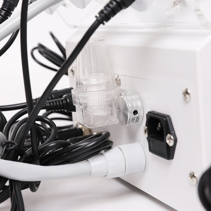 Close-up of a power strip with multiple cables plugged into it on a white background