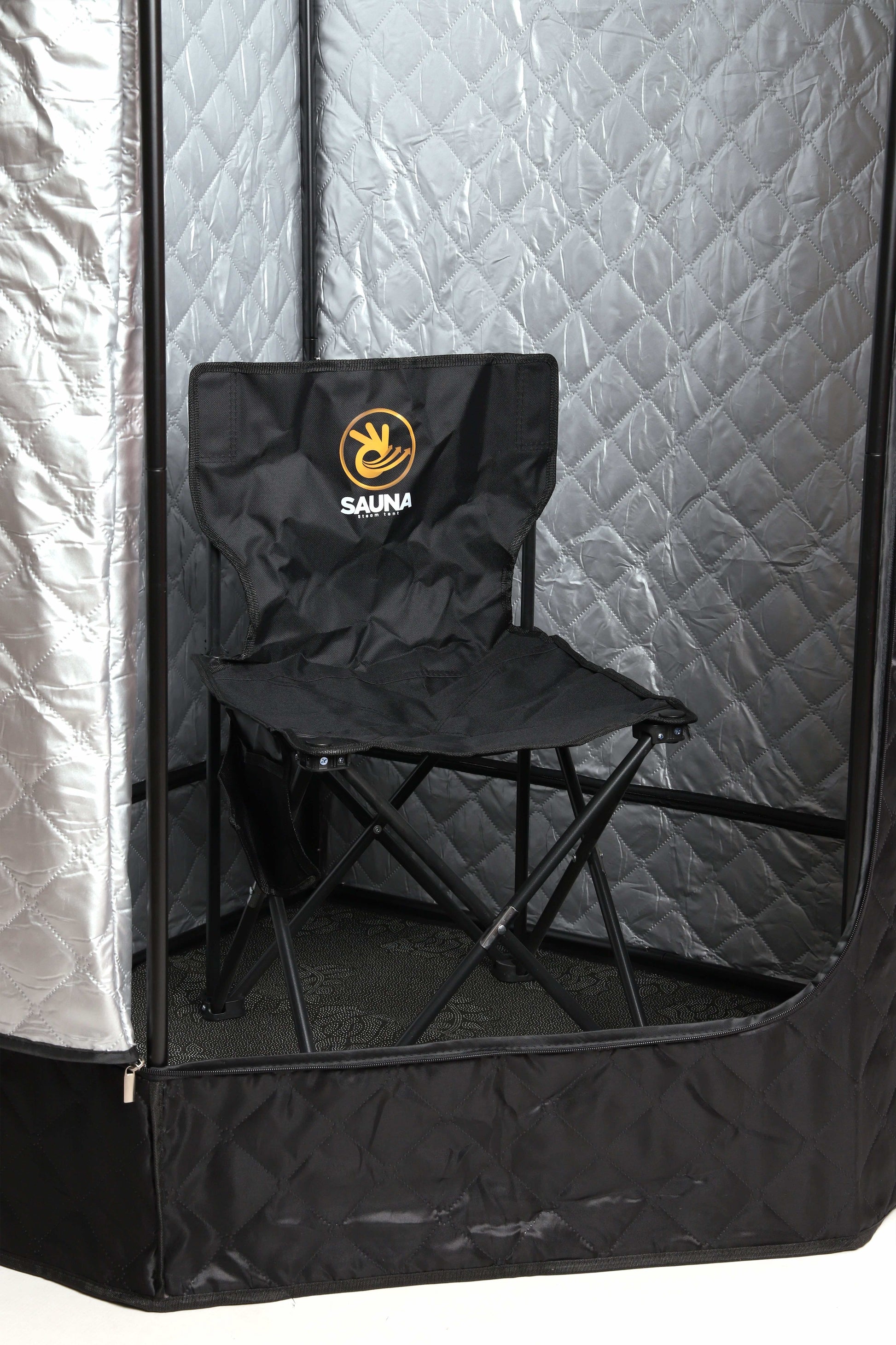 Foldable black chair with “SAUNA” logo placed inside the steam sauna tent.