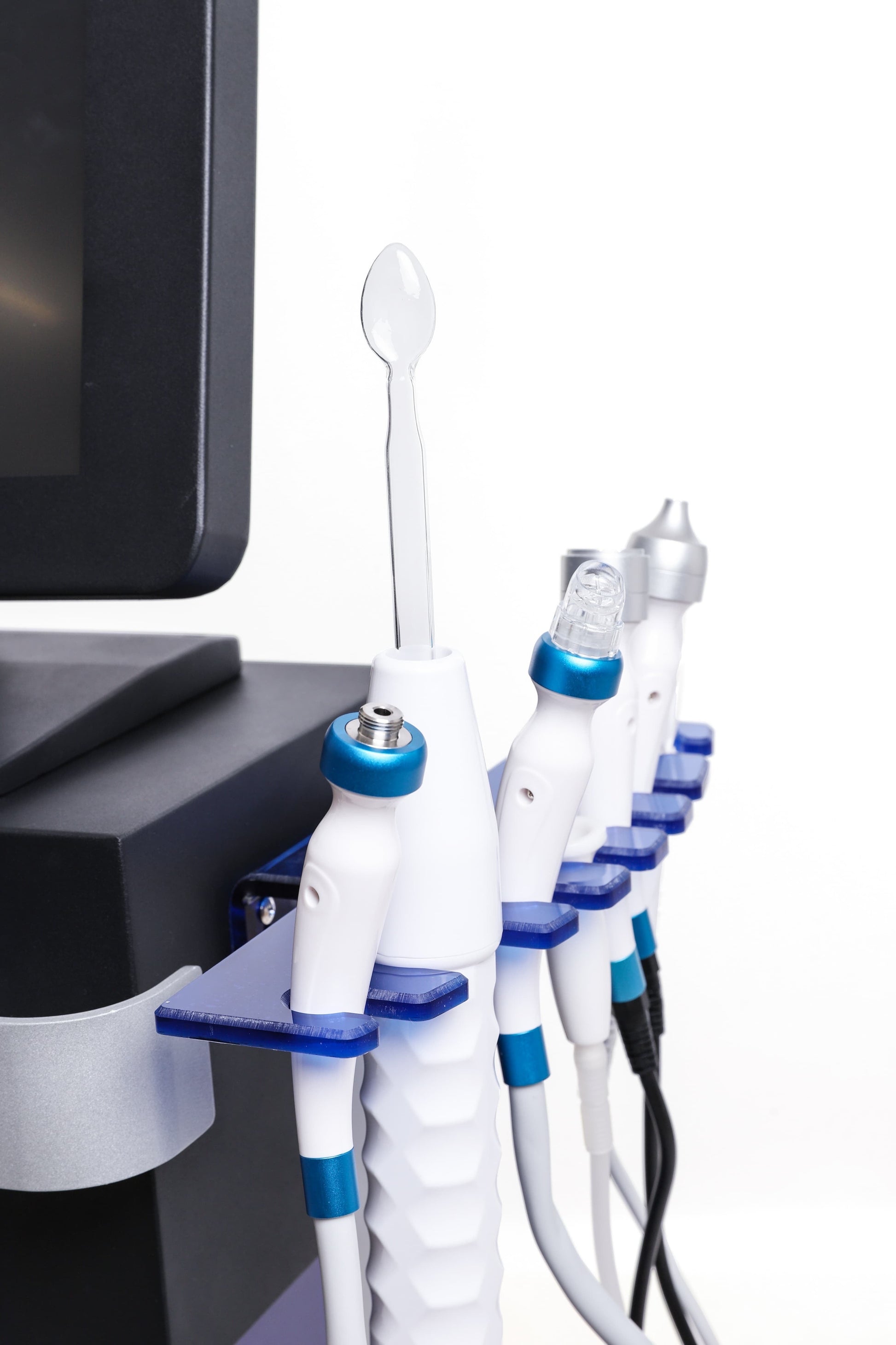 Close-up of Hydra Smart Beauty machine handpieces for hydrafacial treatments, deep cleansing, and skin rejuvenation