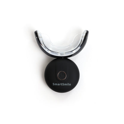 LED-powered SmartSmile mouth tray for at-home teeth whitening treatments.