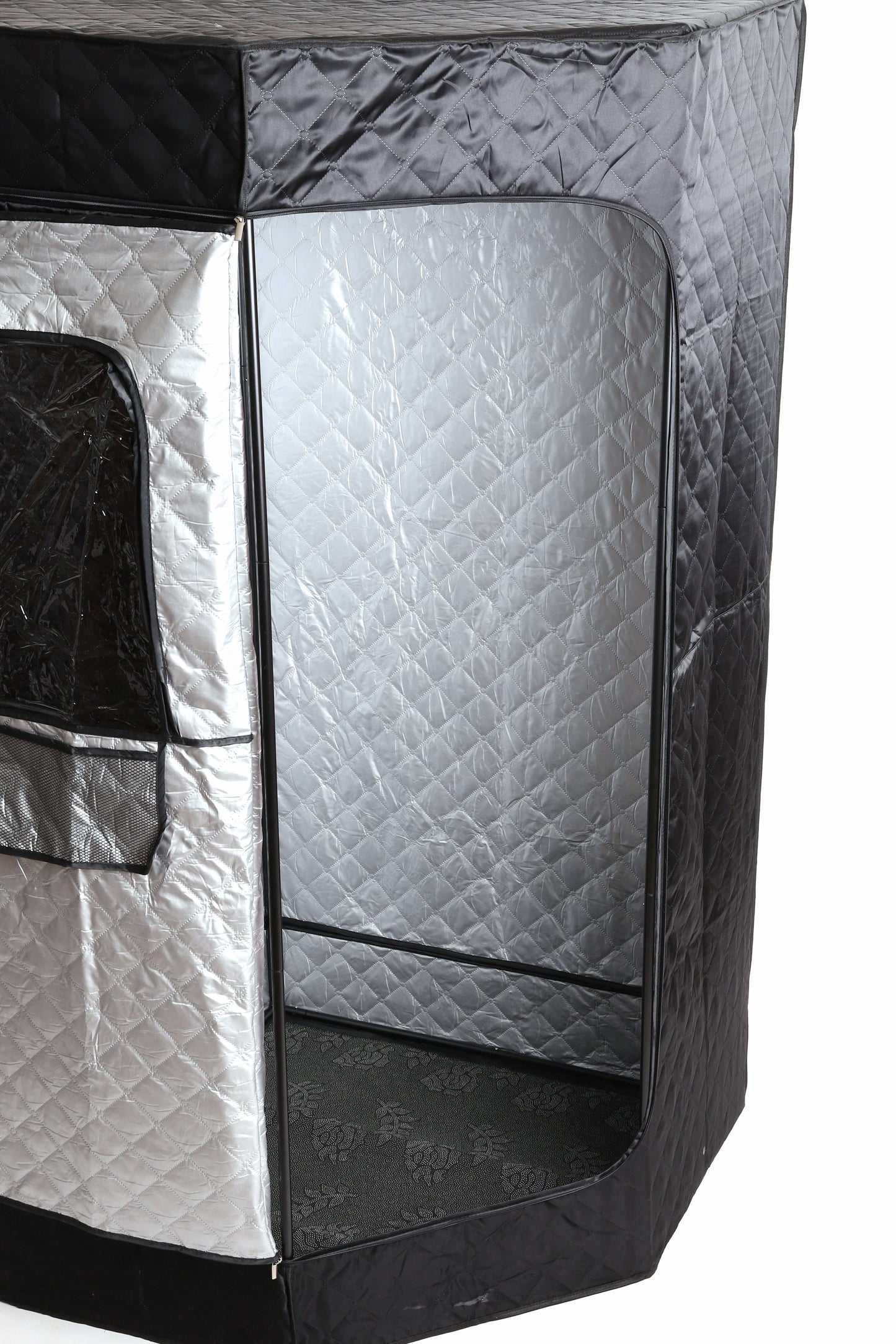 Side view of the open sauna tent showing silver quilted inner lining.