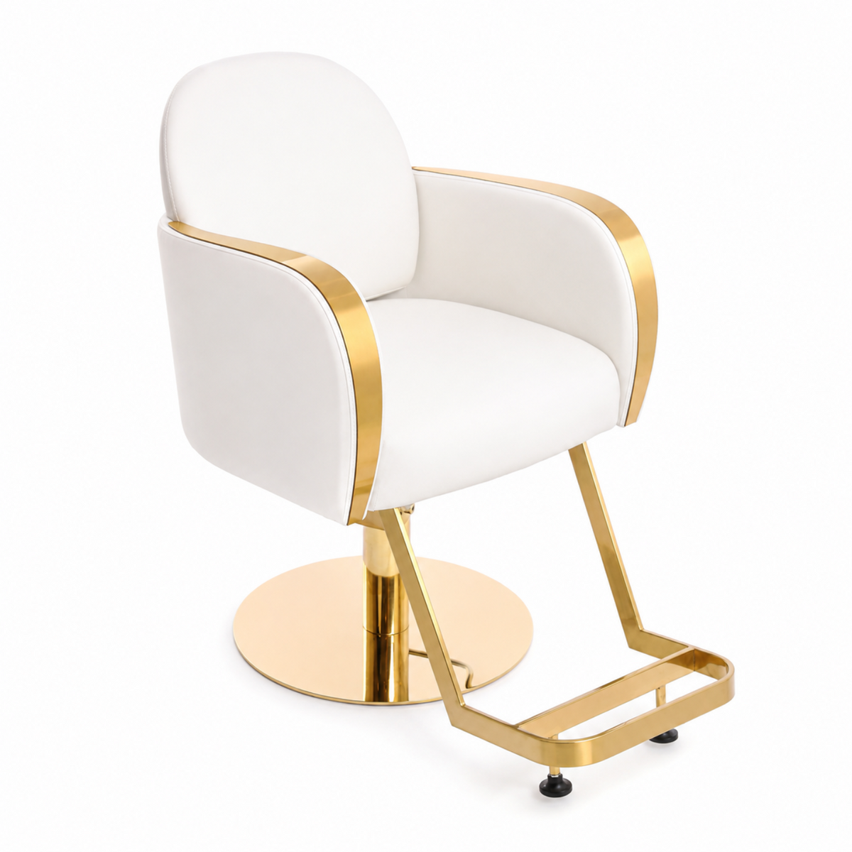 A modern salon barber chair with white faux leather upholstery and polished gold metal accents.