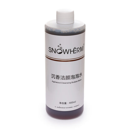 Bottle of SNOWERM cleansing bubble water on a white background