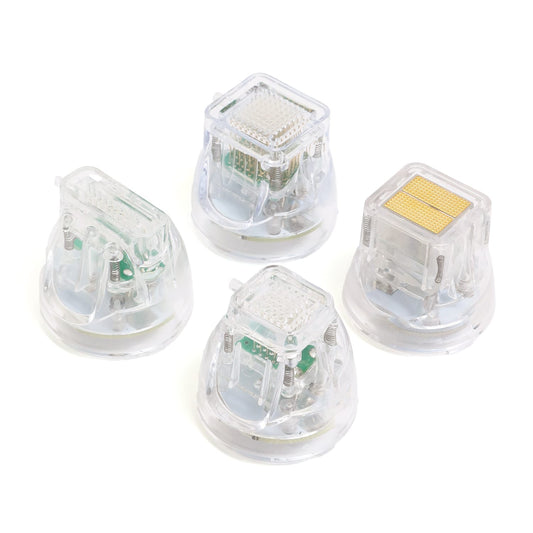 set of four transparent rf microneedling cartridges with varied needle configurations for targeted skin treatments. 