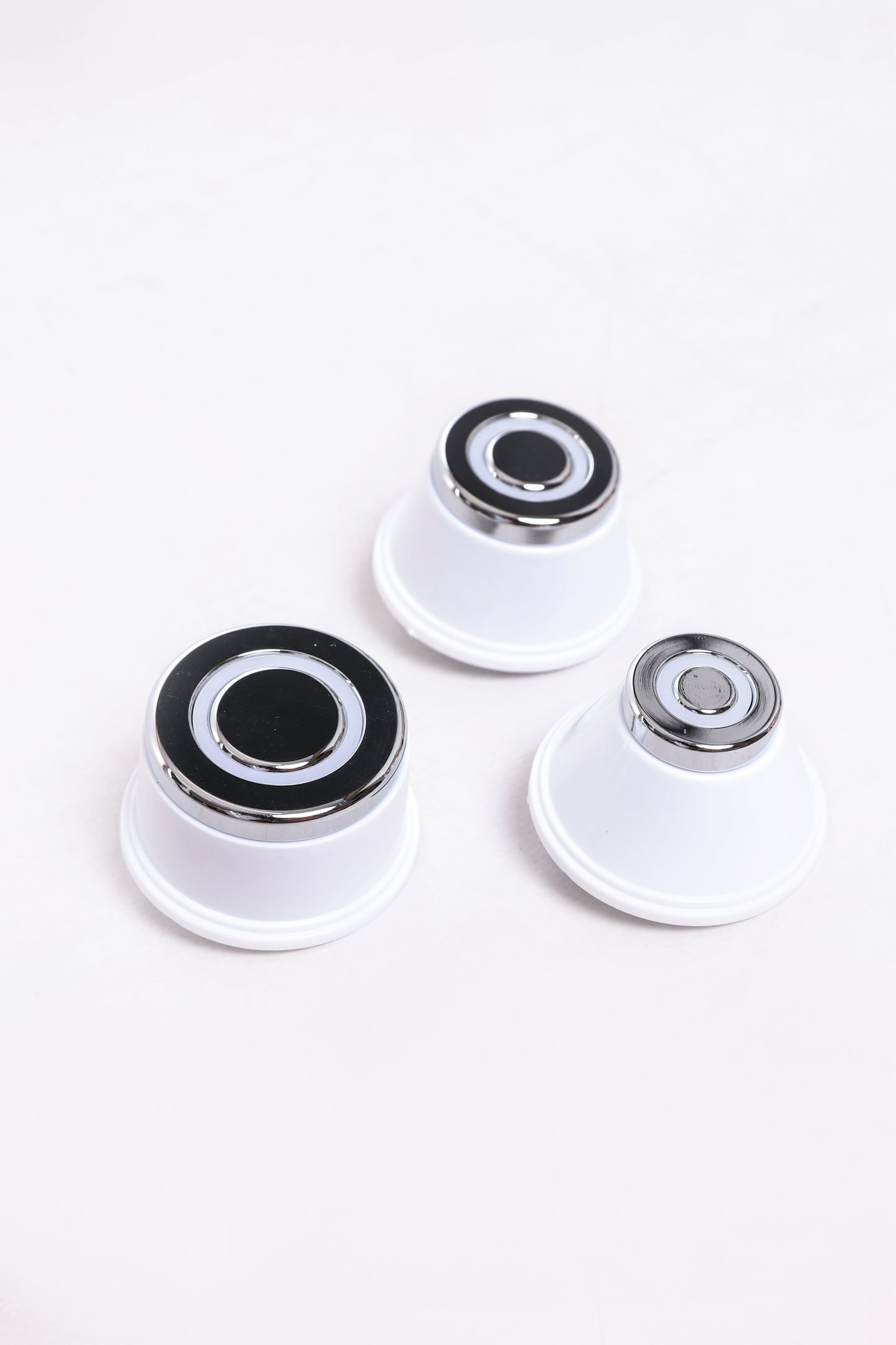 Interchangeable RF heads in multiple sizes for facial and body treatments using radiofrequency technology