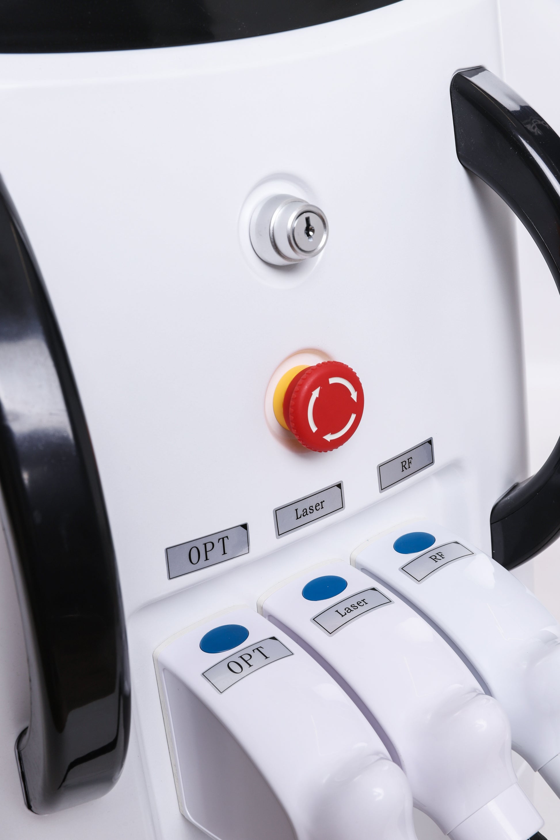 Laser hair removal machine interface showing OPT, laser, and RF control handles and emergency stop button