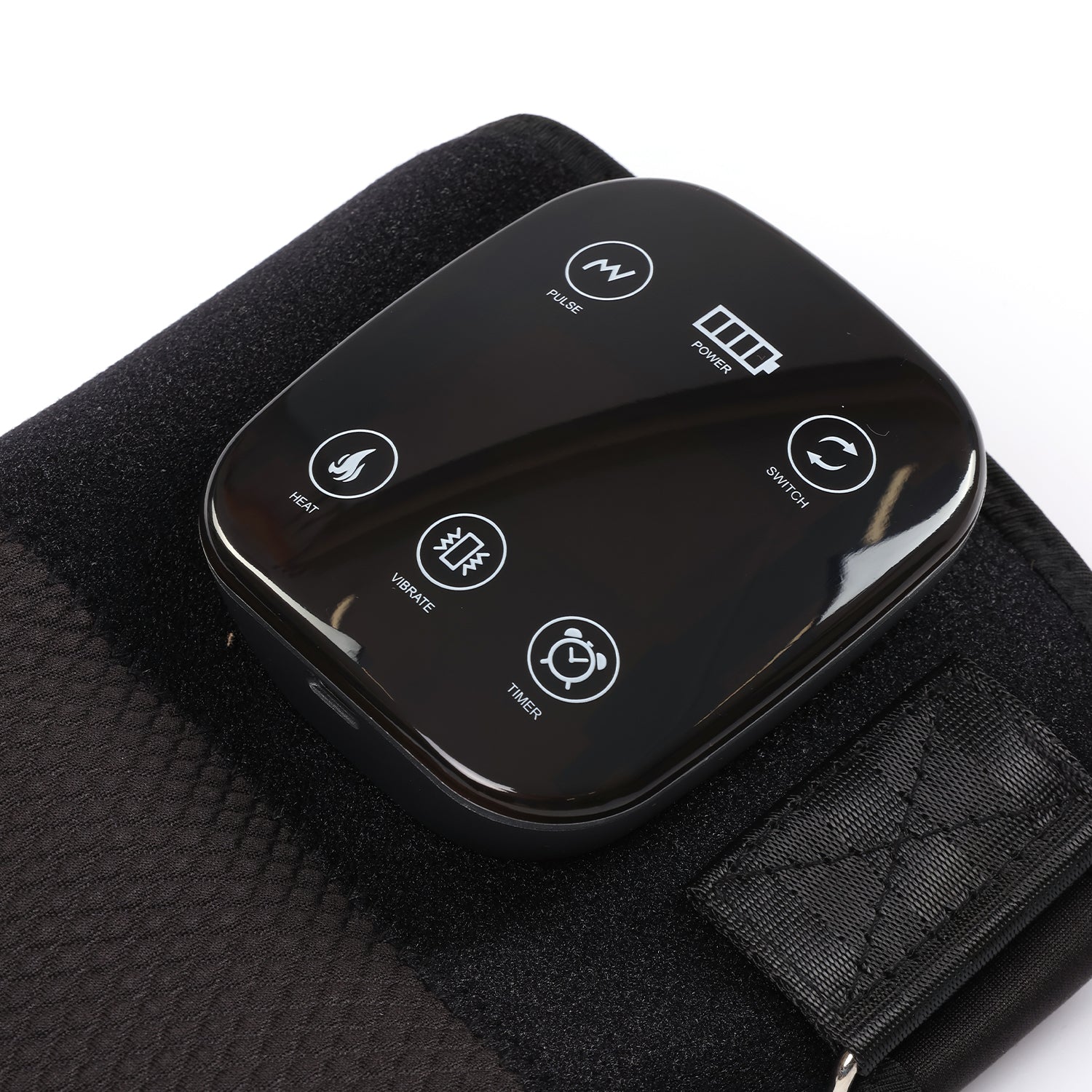 Black electronic device with control panel for red light knee pad