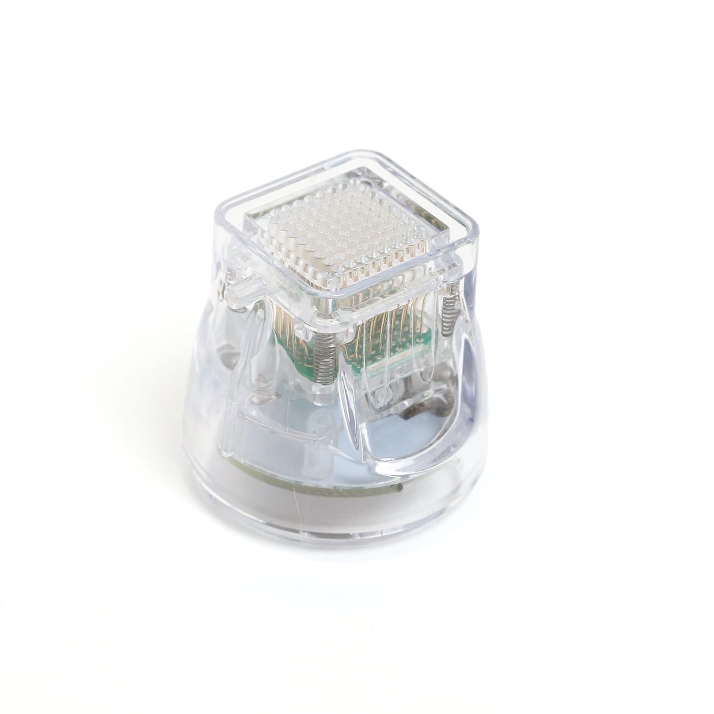 Clear plastic component with metallic interior on a white background